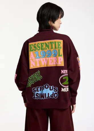 Felpa in cotone con stampa grafica bordeaux e multicolore