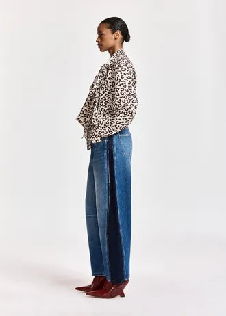 Jeans a barilotto con inserti blu scuro e neri