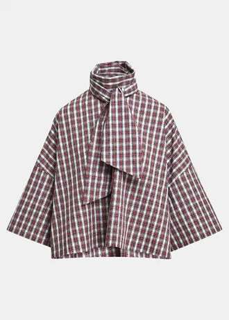 Top with blue, red, and dark green plaid bow, with bell sleeves