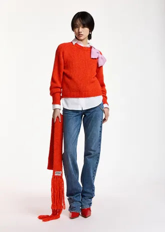 Maglione con fiocco rosso e rosa