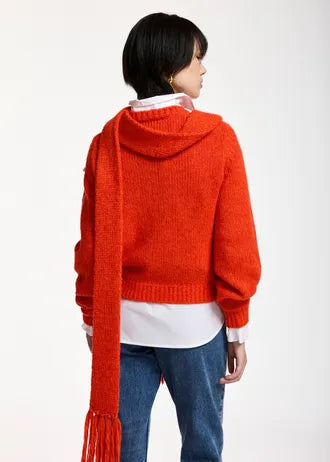 Maglione con fiocco rosso e rosa