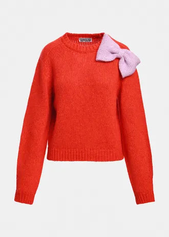 Maglione con fiocco rosso e rosa