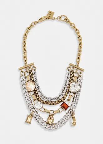 Layered gold and silver chain necklace with gemstones