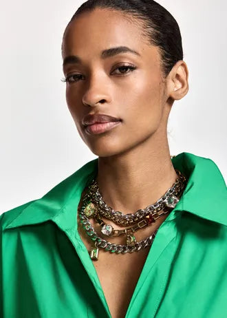 Layered gold and silver chain necklace with gemstones