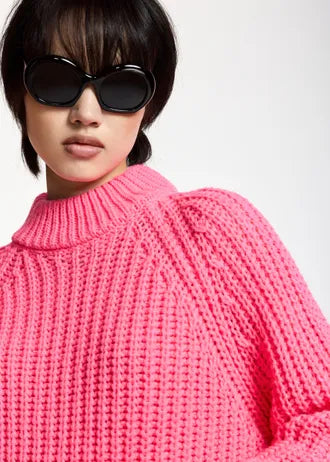 Maglione rosa a collo alto chunky con maniche voluminose